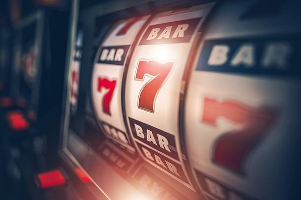 Roulette table in live studio with professional croupier and betting layout visible on screen